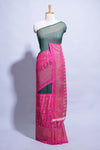 Dark green color budget silk saree with contrast foil print border and contrast pallu along with contrast blouse piece