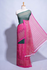 Dark green color budget silk saree with contrast foil print border and contrast pallu along with contrast blouse piece