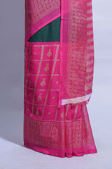 Dark green color budget silk saree with contrast foil print border and contrast pallu along with contrast blouse piece