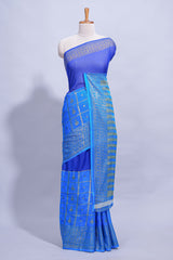 Royal blue color budget silk saree with contrast foil print border and contrast pallu along with contrast blouse piece