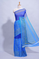 Royal blue color budget silk saree with contrast foil print border and contrast pallu along with contrast blouse piece