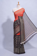 Rust Orange georgette saree with contrast foil print border and contrast pallu along with contrast blouse piece