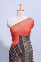 Rust Orange georgette saree with contrast foil print border and contrast pallu along with contrast blouse piece
