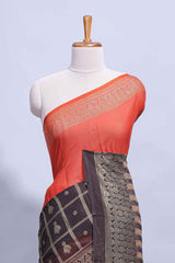 Rust Orange color budget silk saree with contrast foil print border and contrast pallu along with contrast blouse piece