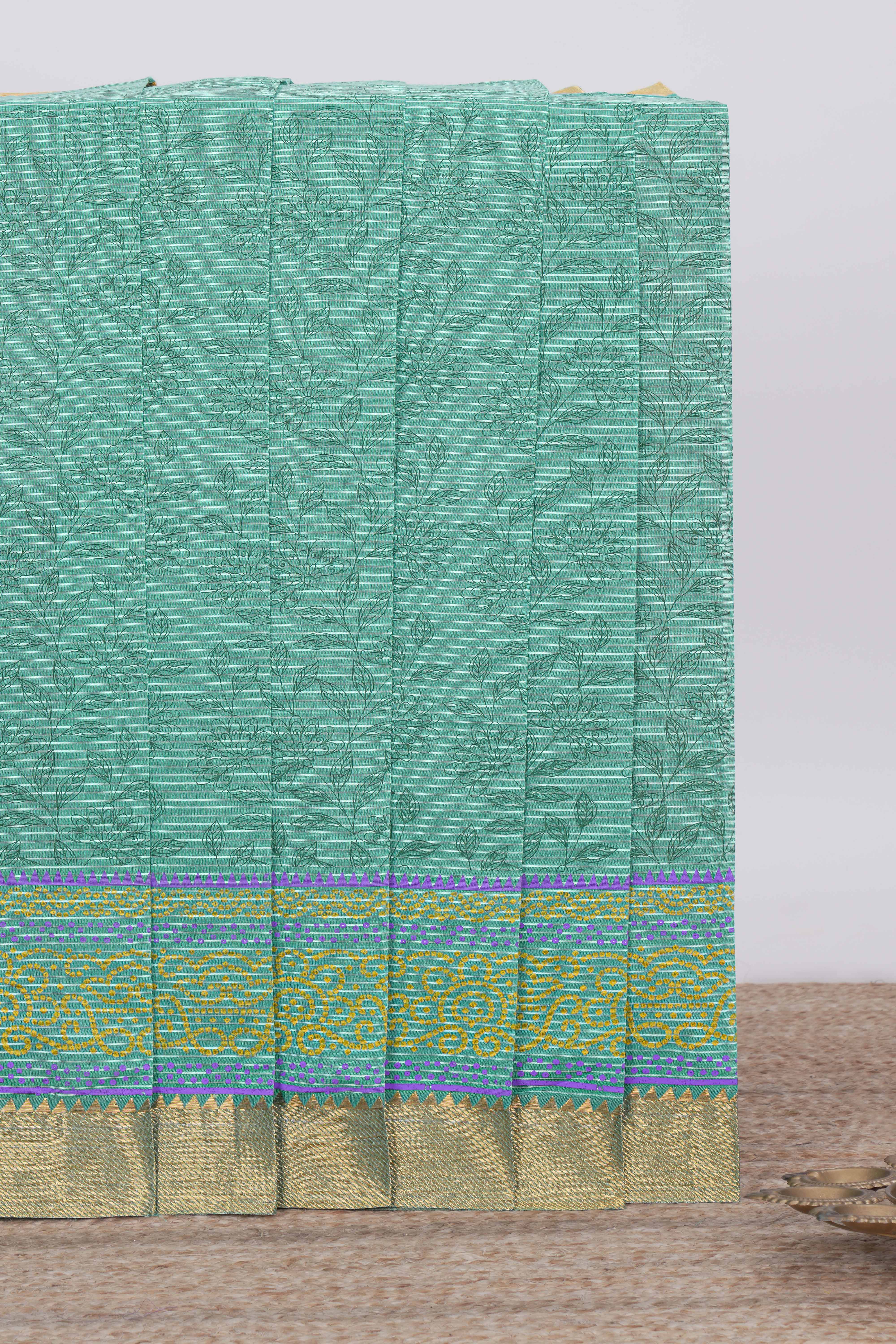 Green striped floral design chirala cotton saree with self zari border and matching blouse