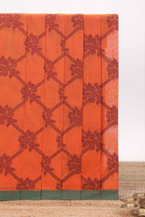 Orange floral and geometric designed chirala cotton saree with contrast border and self floral motif pallu