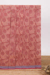Peach floral designed chirala cotton saree with contrast border and self floral motif pallu