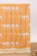 Orange camel motif chirala cotton saree with contrast zari border and blouse