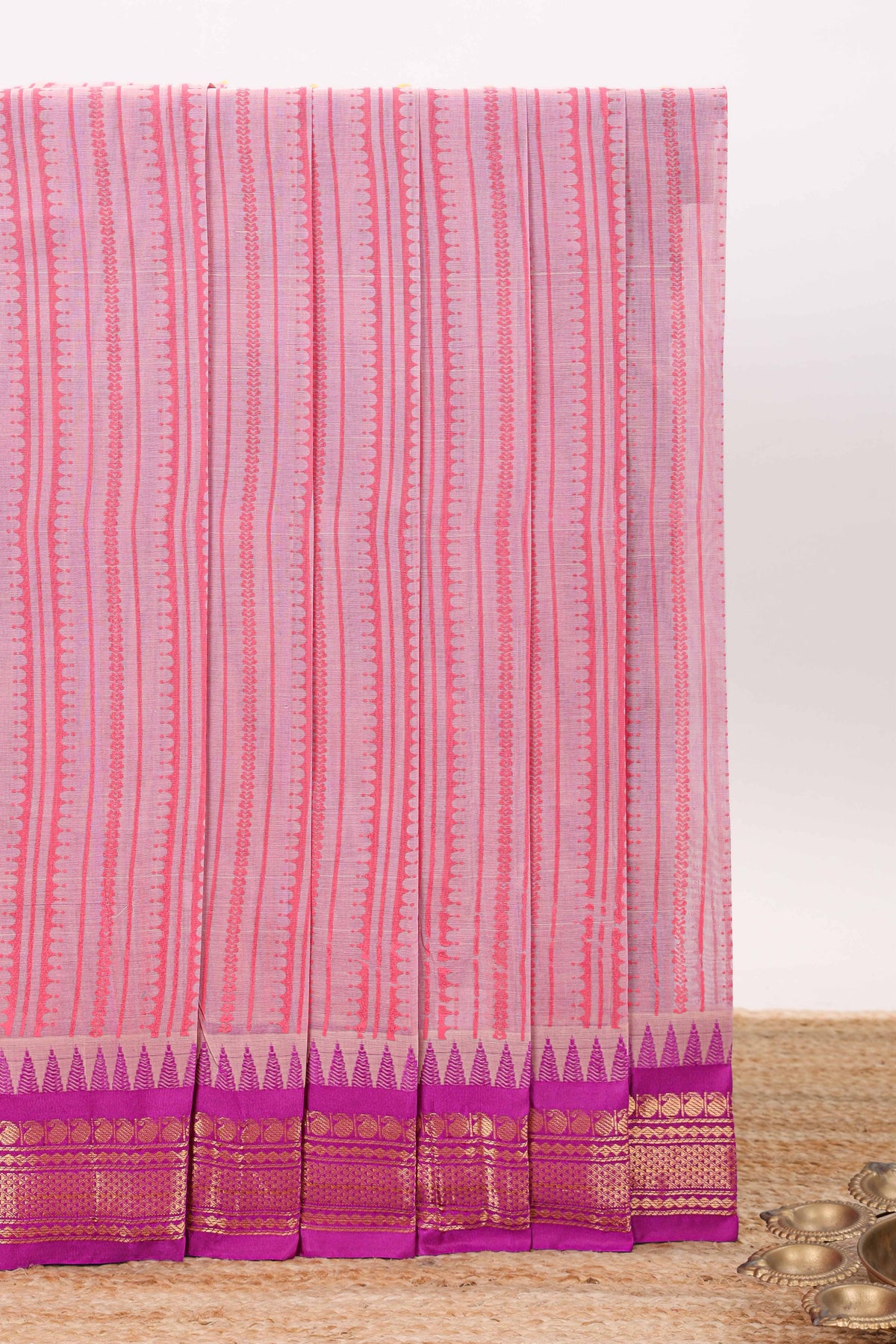 Pink striped chirala cotton saree with contrast zari border and pallu
