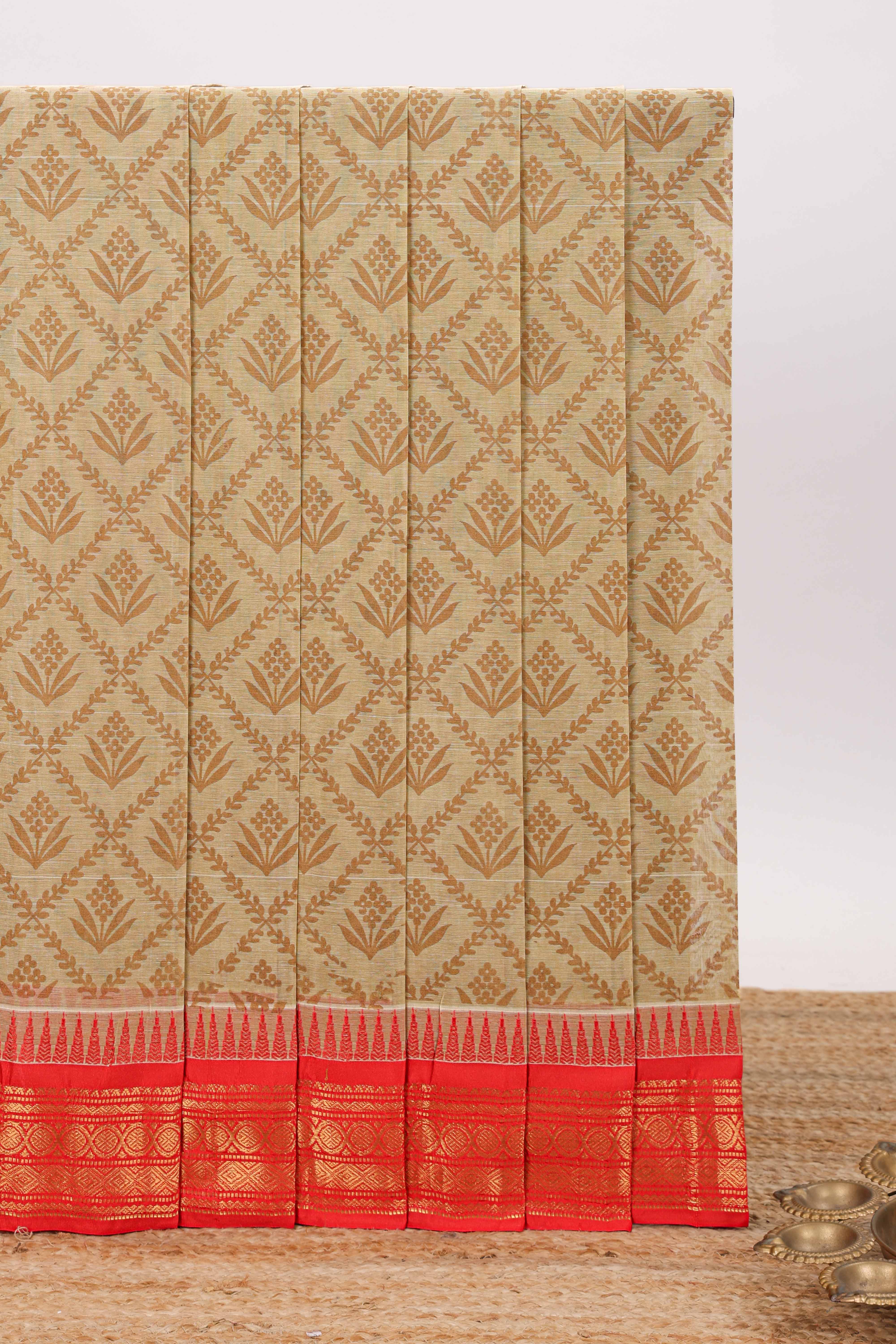 Beige geometric floral design chirala cotton saree with contrast border and zari design pallu