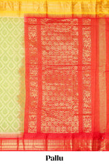 Green geometric floral design chirala cotton saree with contrast border and zari design pallu