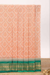 Peach geometric floral design chirala cotton saree with contrast border and zari design pallu