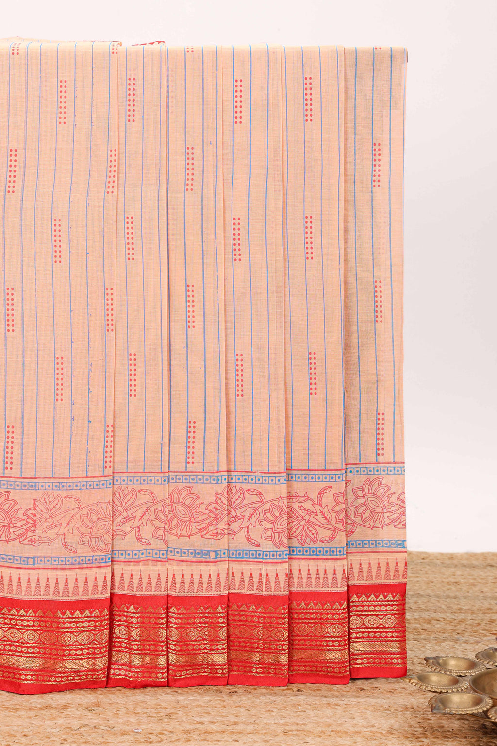 Peach striped bottom floral design chirala cotton saree with contrast border and zari design pallu
