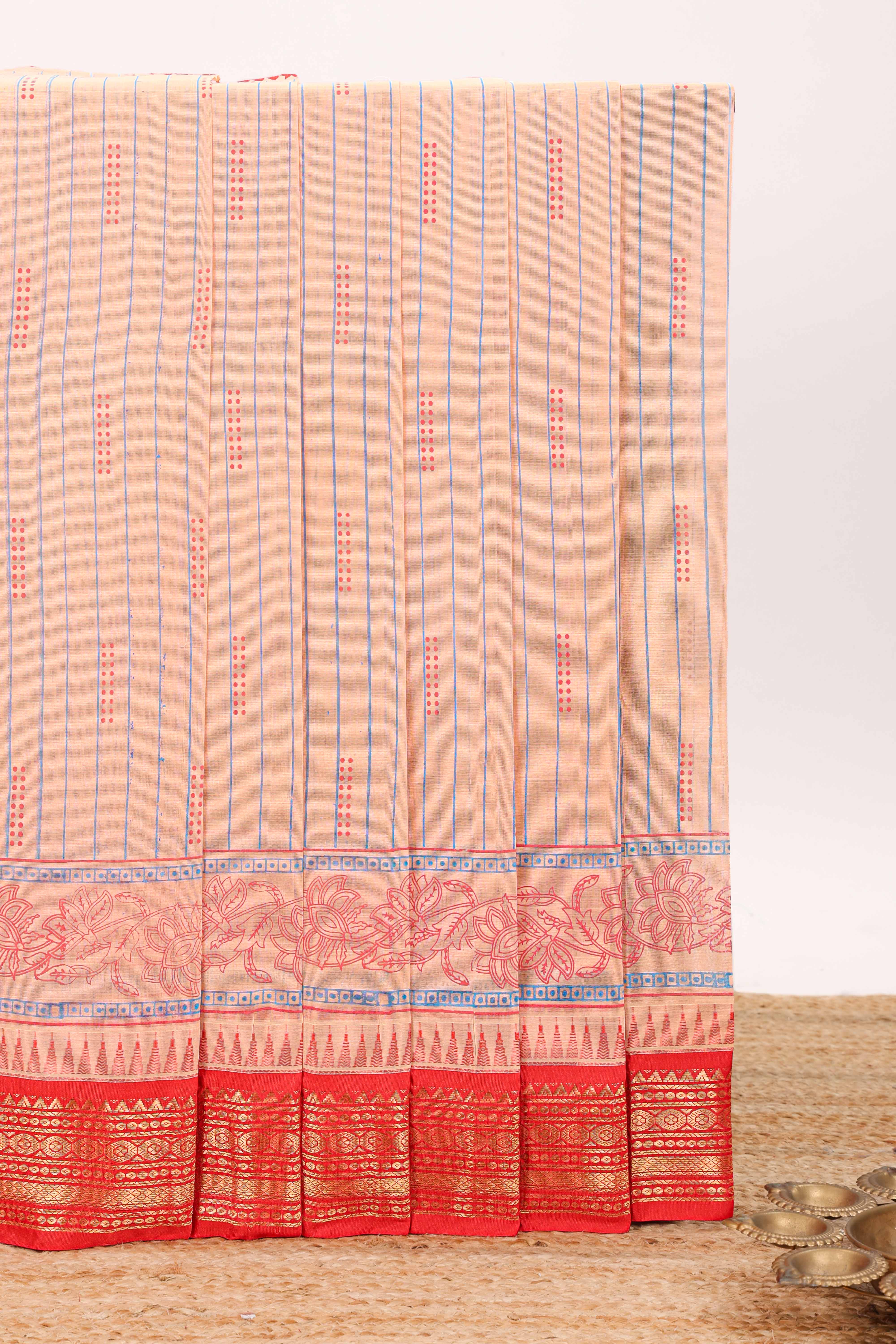 Peach striped bottom floral design chirala cotton saree with contrast border and zari design pallu