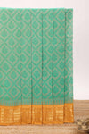 Jungle green geometric floral design chirala cotton saree with contrast border and zari design pallu