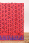 Coral red butta designed chirala cotton saree with self border and contrast blouse
