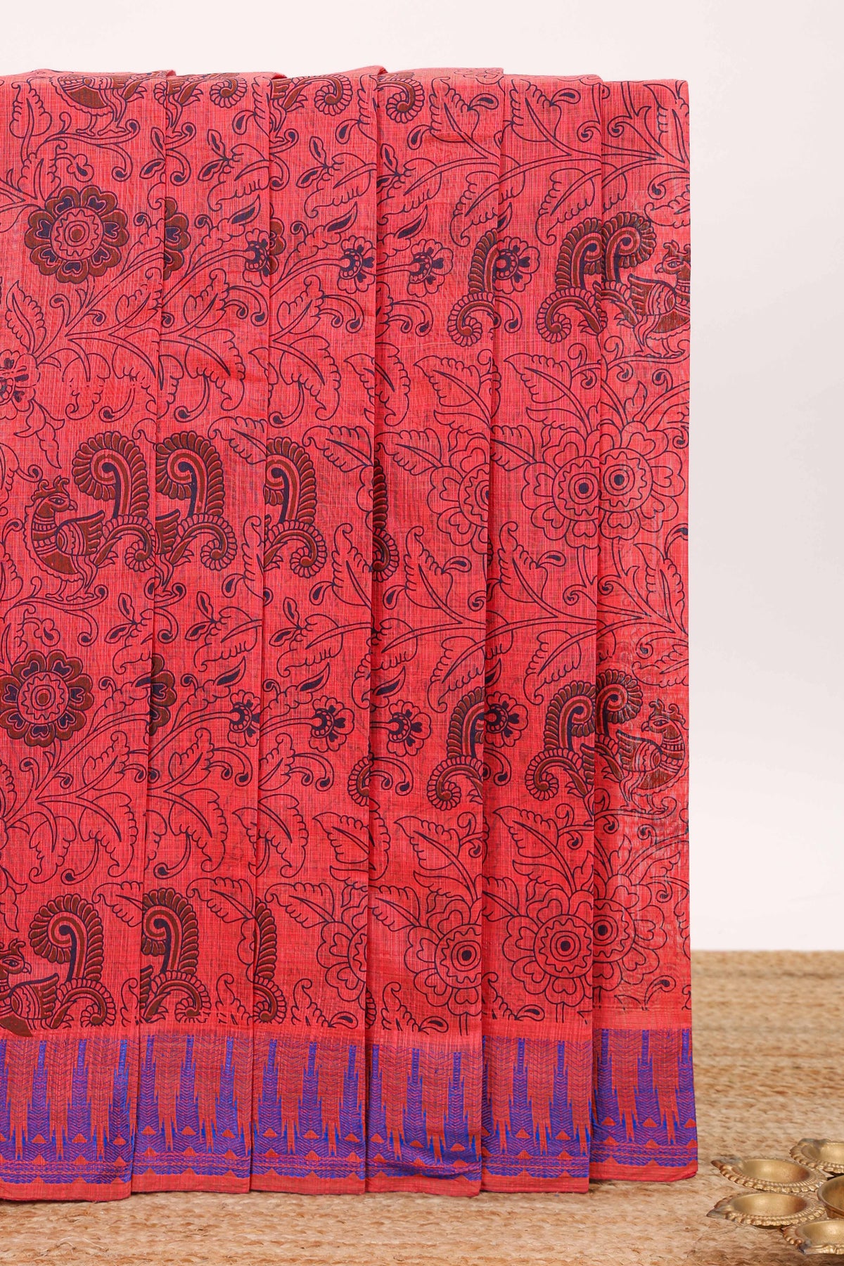 Red floral designed chirala cotton saree with self border and contrast blouse