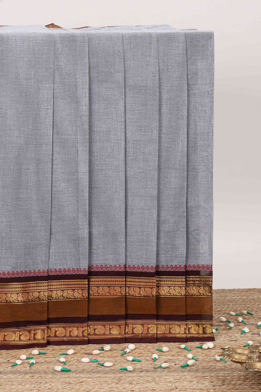 Grey plain chettinad cotton saree with contrast zari border and stripe pallu