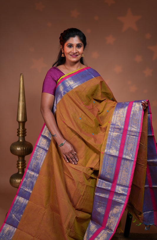 Mustard plain chettinad cotton saree with contrast bentex zari border and floral motifs pallu