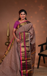 Sand plain chettinad cotton saree with contrast bentex zari border and floral motifs pallu