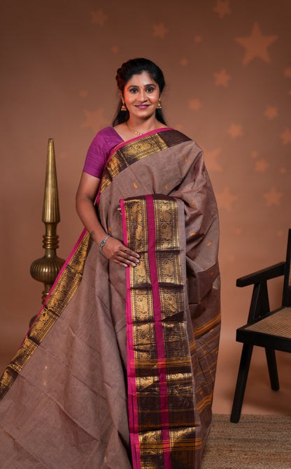 Sand plain chettinad cotton saree with contrast bentex zari border and floral motifs pallu