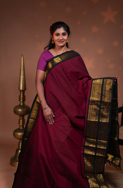 Red plain chettinad cotton saree with contrast bentex zari border and striped pallu
