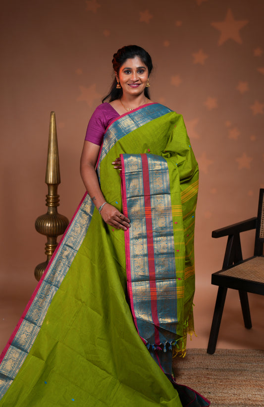 Green plain chettinad cotton saree with contrast bentex zari border and motifs pallu