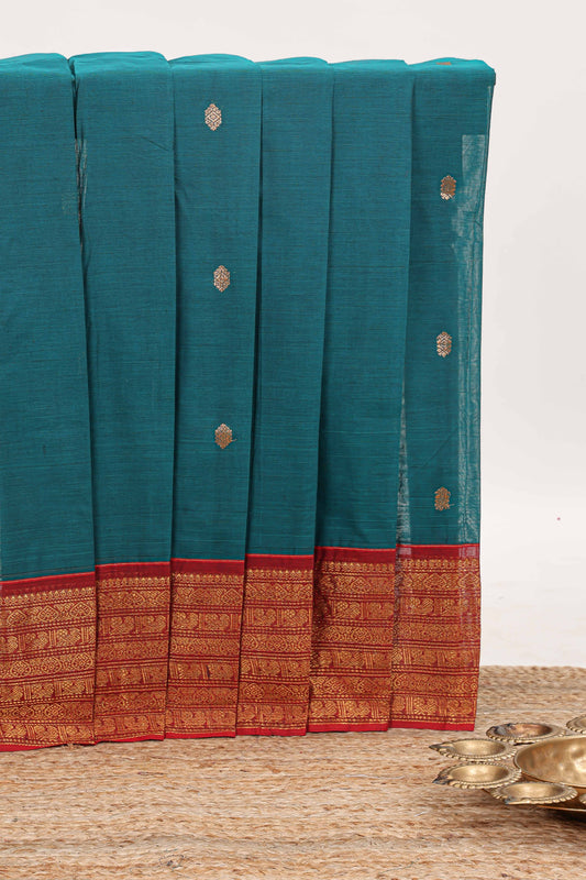 Midnight green zari butta chettinad cotton saree with contrast zari border and matching pallu
