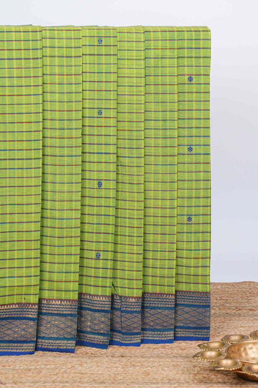 Green checked floral motifs chettinad cotton saree with contrast border and matching blouse