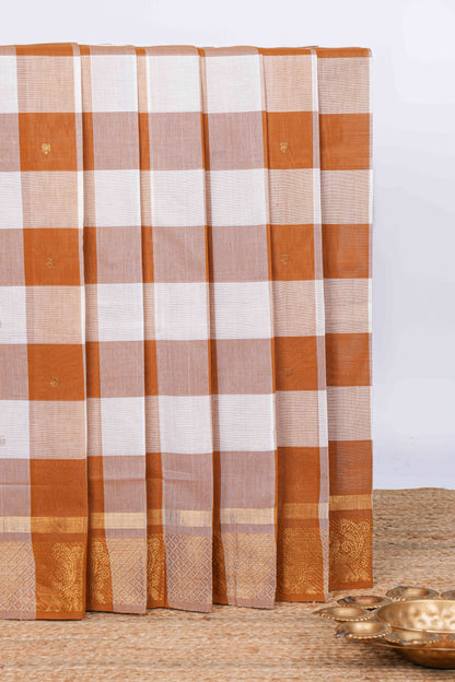 Burnt orange and white checked zari motifs chettinad cotton saree with self zari border and matching pallu