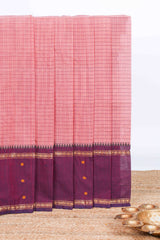 Peach checked chettinad cotton saree with contrast zari border and matching striped pallu
