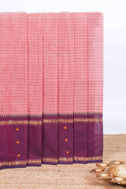 Peach checked chettinad cotton saree with contrast zari border and matching striped pallu