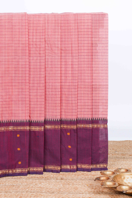 Peach checked chettinad cotton saree with contrast zari border and matching striped pallu