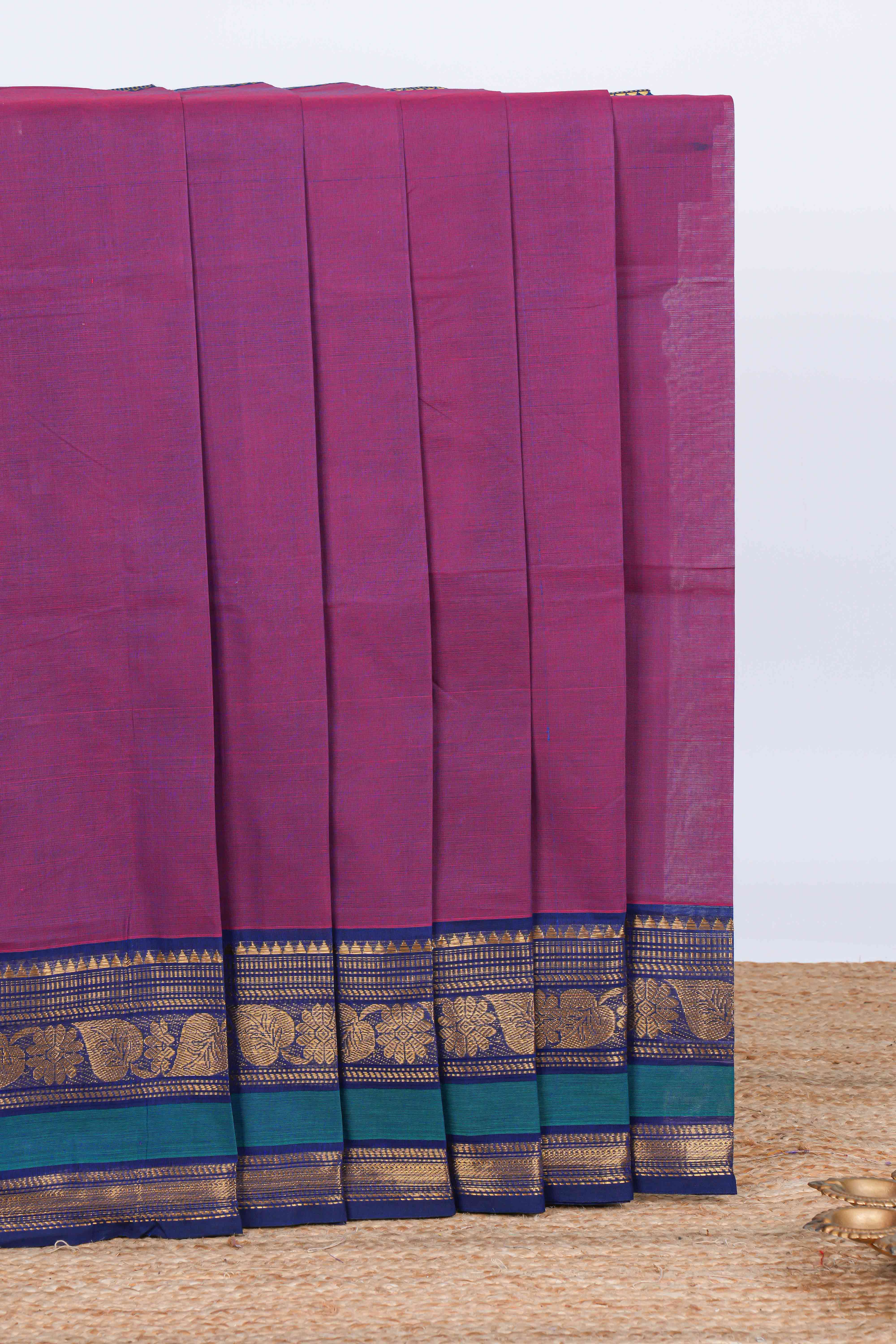 Purple plain chettinad cotton saree with contrast zari border and matching pallu