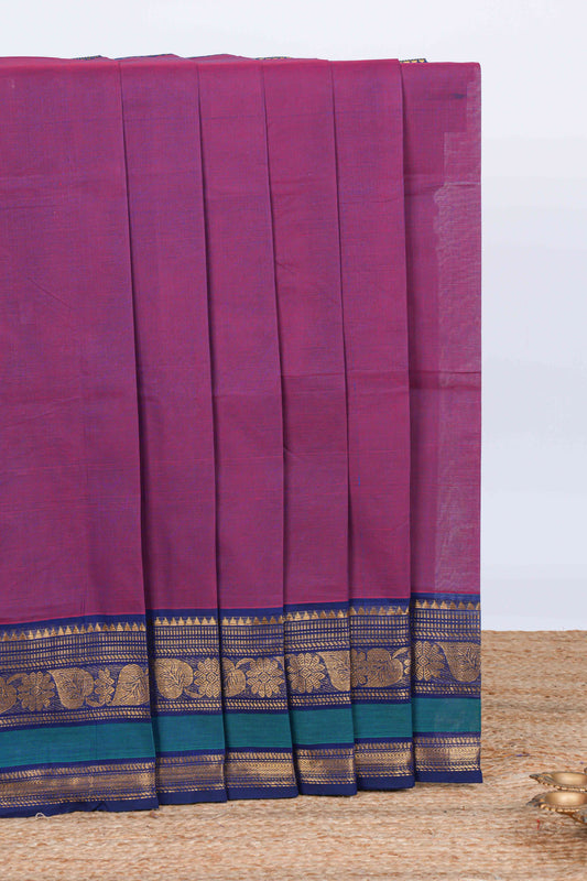 Purple plain chettinad cotton saree with contrast zari border and matching pallu