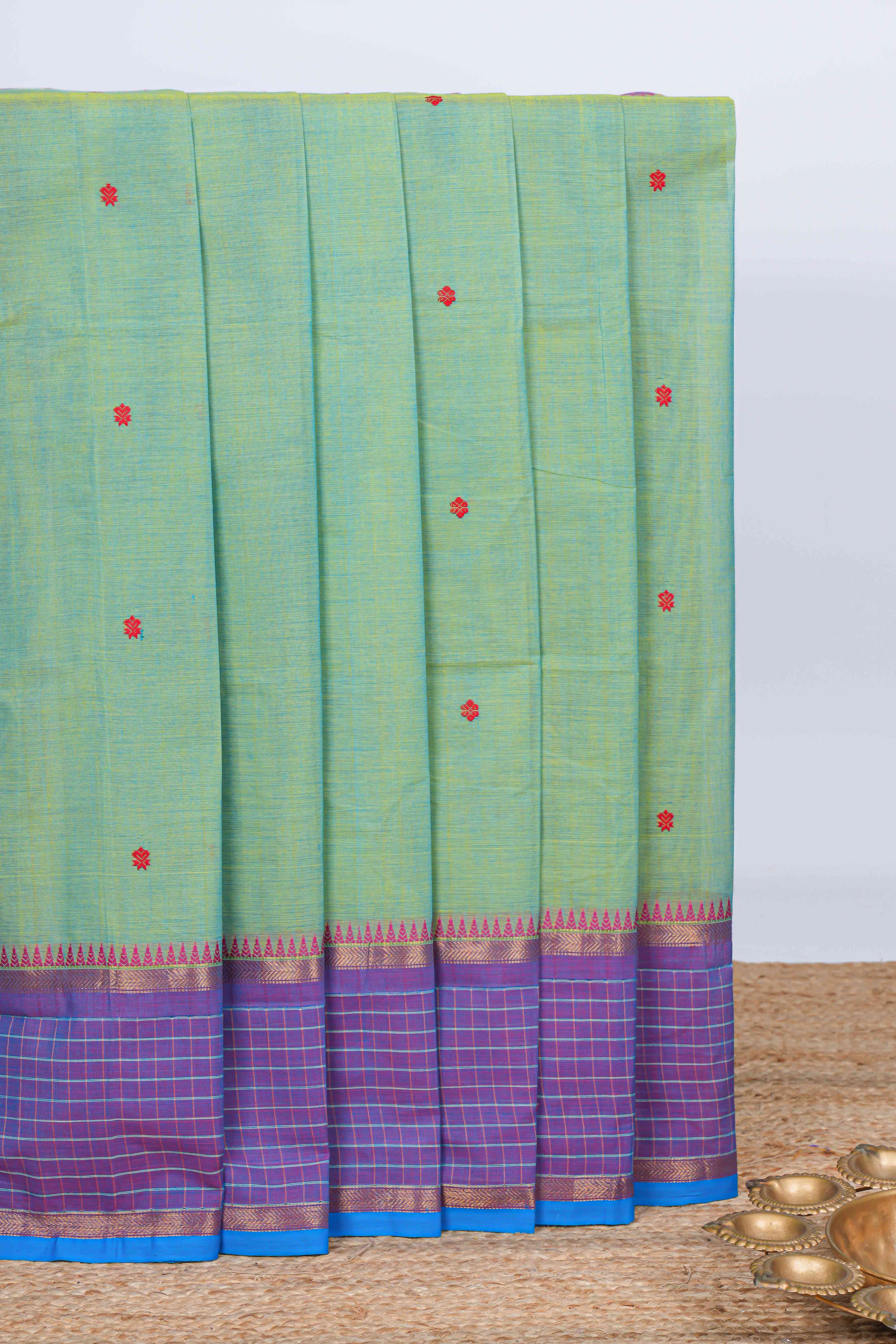 Green thread motifs chettinad cotton saree with contrast zari border and matching pallu