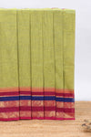 Green striped chettinad cotton saree with contrast zari border and matching blouse