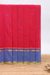 Red butta chettinad cotton saree with contrast checked border and matching blouse