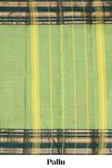 Green plain chettinad cotton saree with contrast zari border and matching blouse