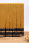 Mustard plain chettinad cotton saree with contrast zari border and matching blouse