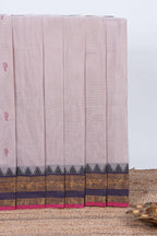 Oyster pink plain chettinad cotton saree with contrast zari border and matching striped pallu