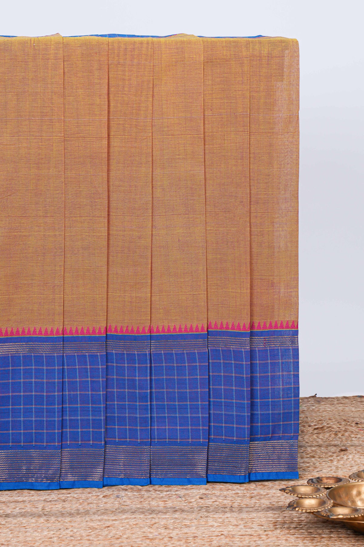 Brown plain chettinad cotton saree with contrast checked border and matching striped pallu
