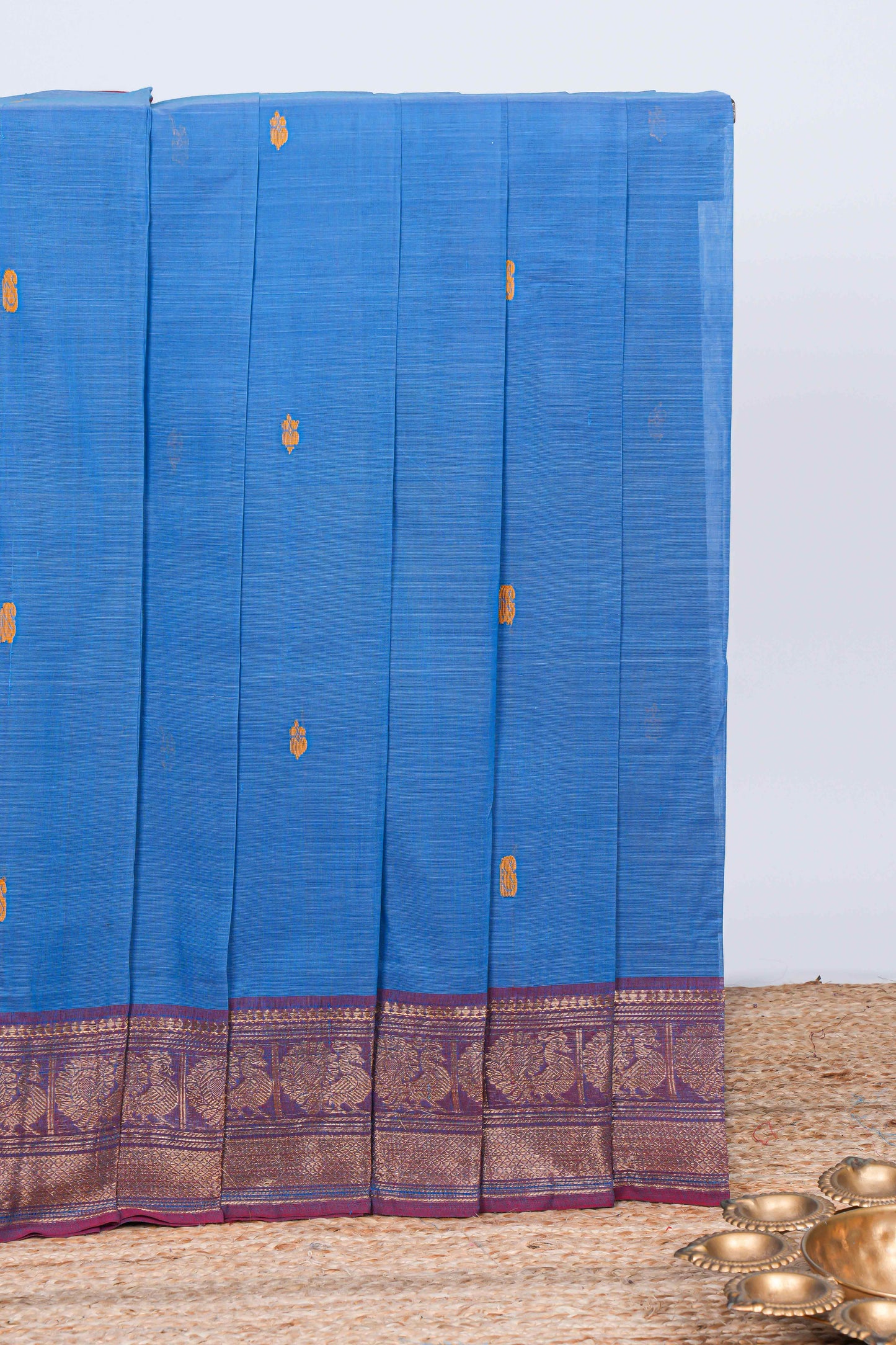 Blue thread motifs chettinad cotton saree with contrast checked border and matching striped pallu