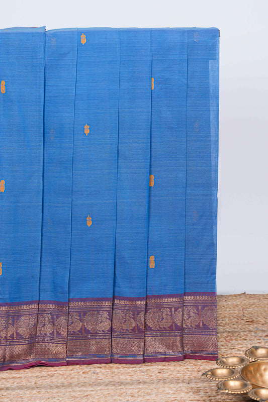 Blue thread motifs chettinad cotton saree with contrast checked border and matching striped pallu