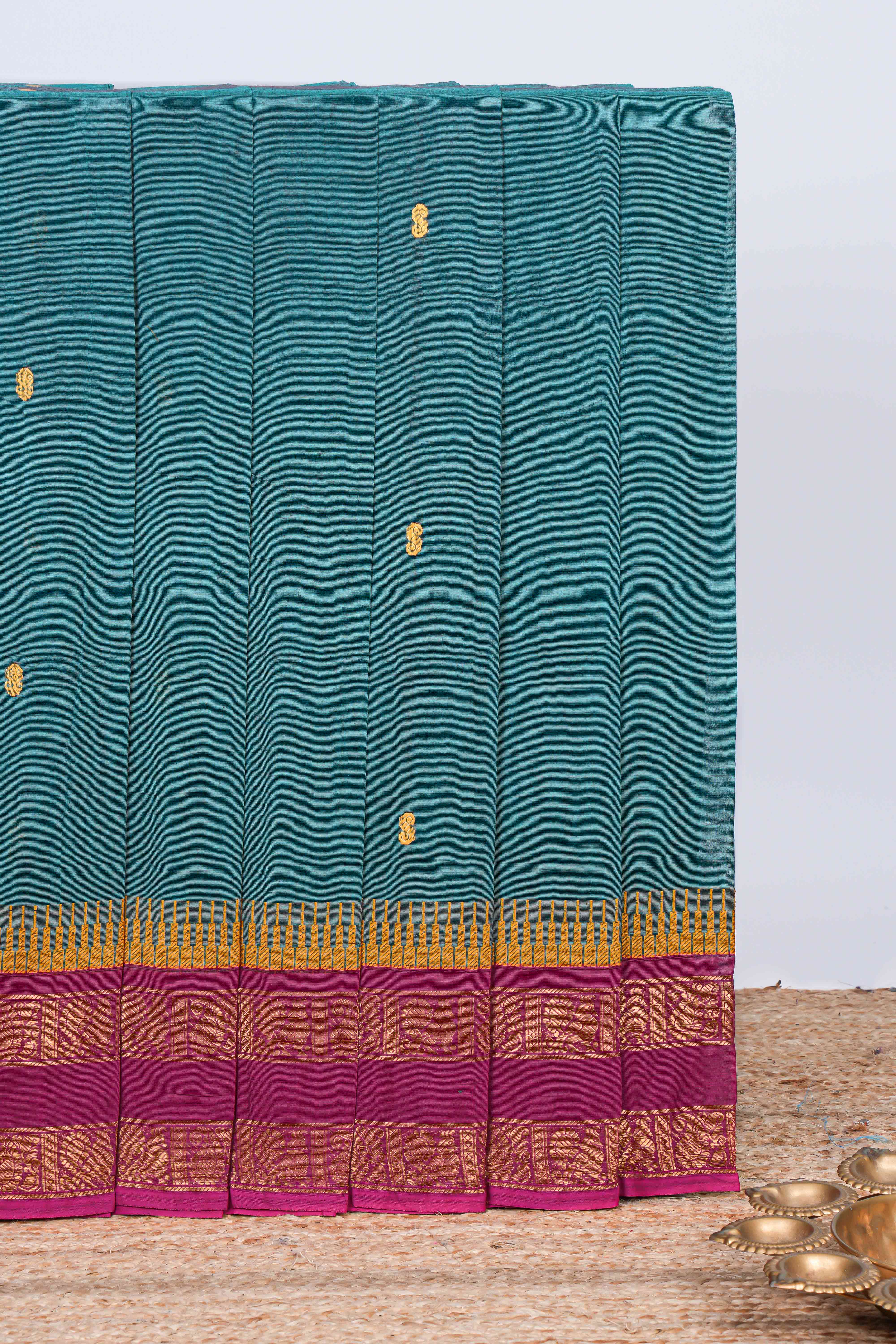 Green thread butta chettinad cotton saree with contrast bentex border and matching striped pallu