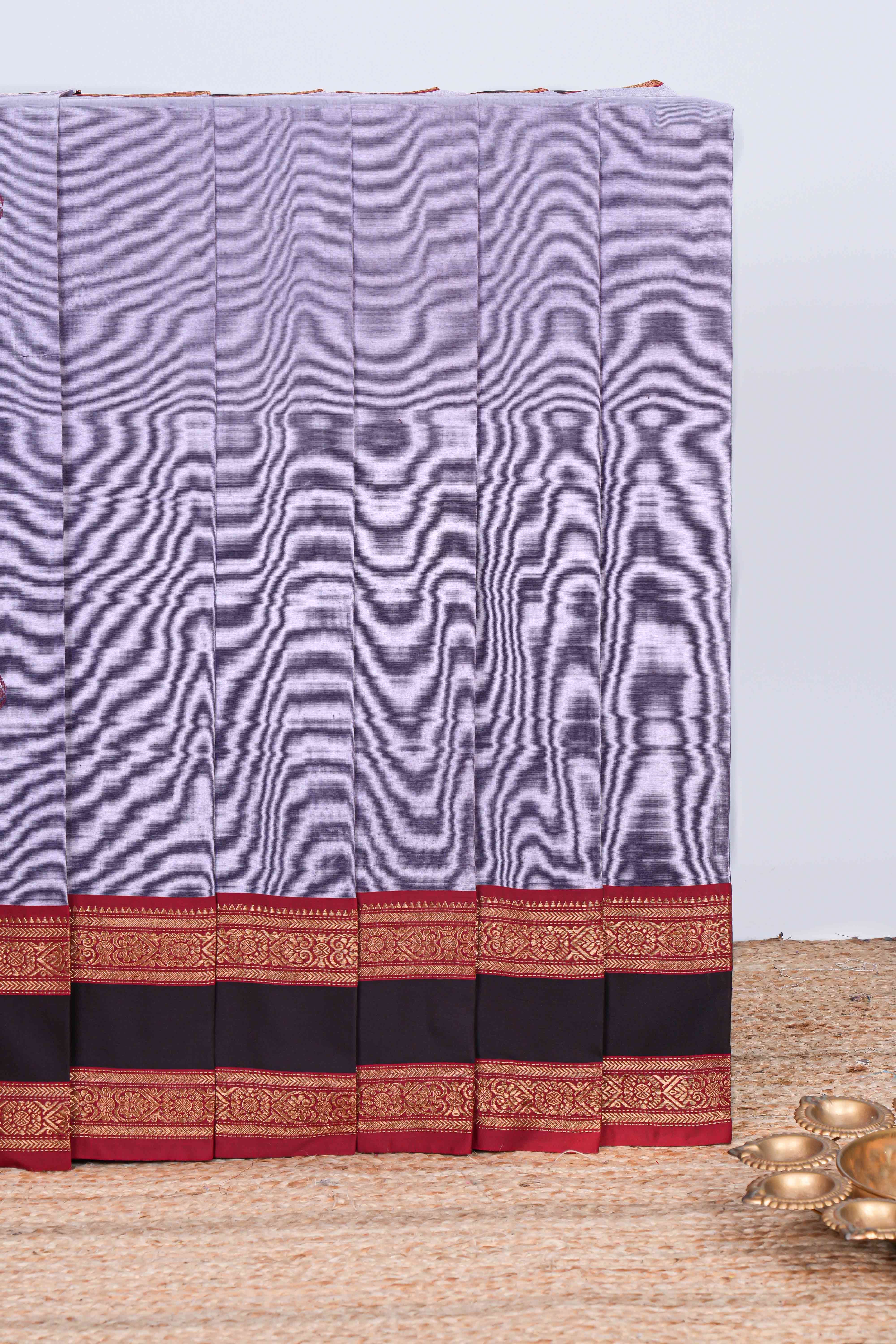 Lavender plain chettinad cotton saree with contrast border and matching striped pallu