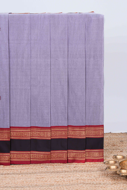 Lavender plain chettinad cotton saree with contrast border and matching striped pallu