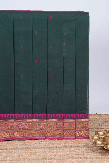 Dark green thread butta chettinad cotton saree with contrast border and matching striped pallu