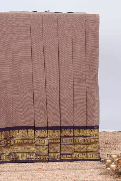Brown plain chettinad cotton saree with contrast border and matching striped pallu