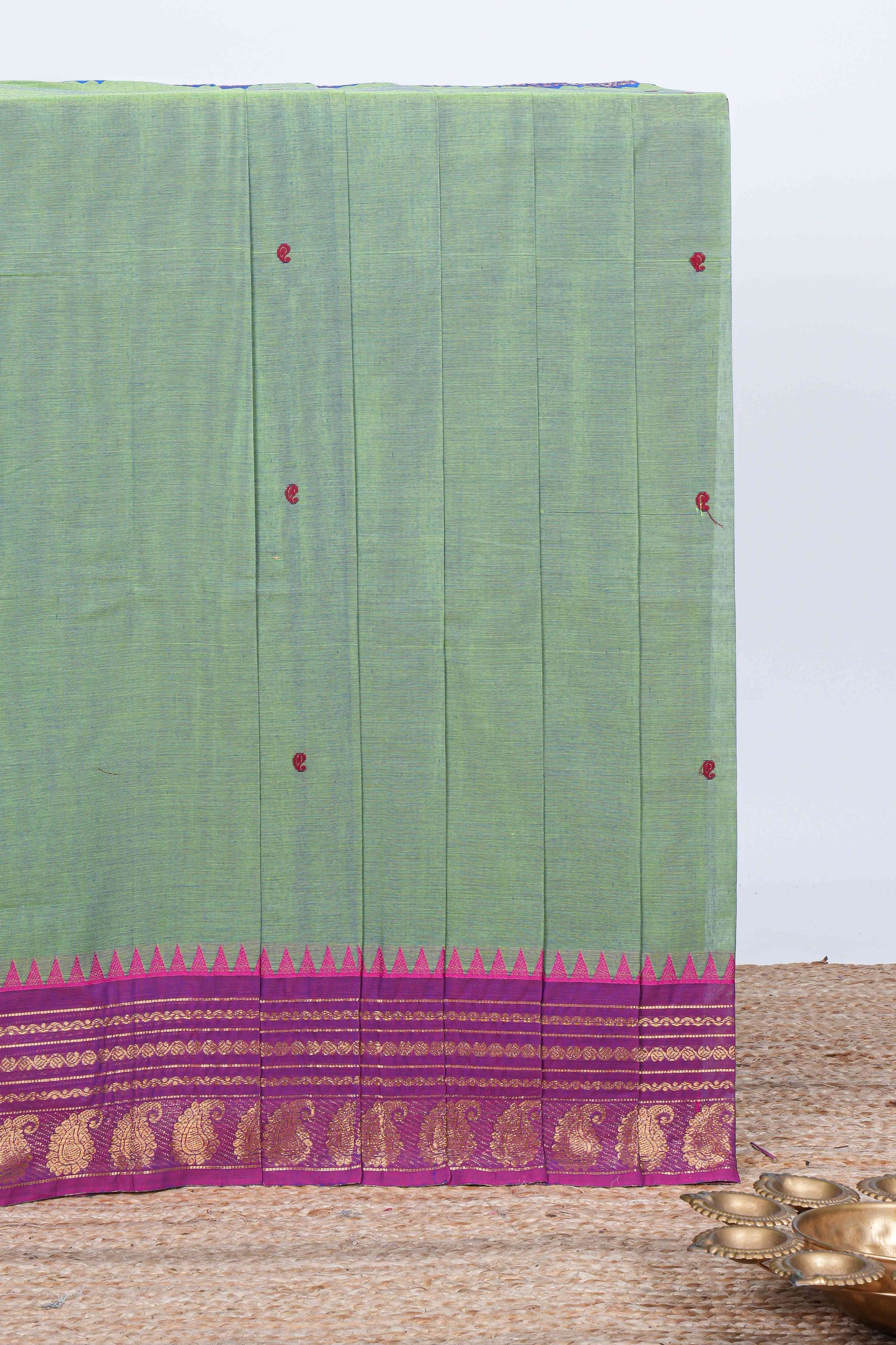 Emerald green thread butta chettinad cotton saree with contrast border and matching striped pallu